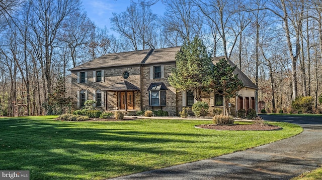 view of front of house with a front lawn