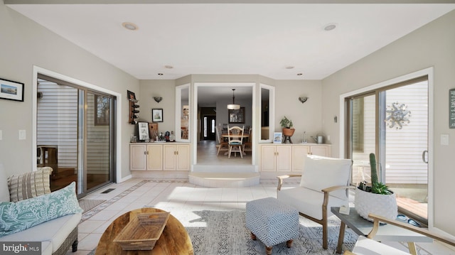 living room featuring light tile patterned flooring