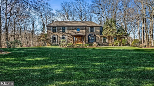 view of front of house featuring a front lawn