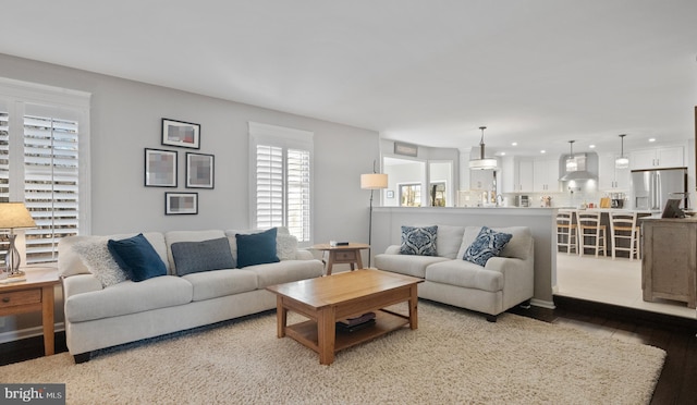 living room with hardwood / wood-style floors