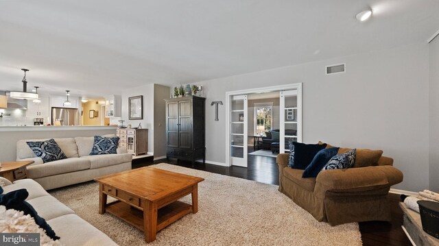 living room with hardwood / wood-style flooring