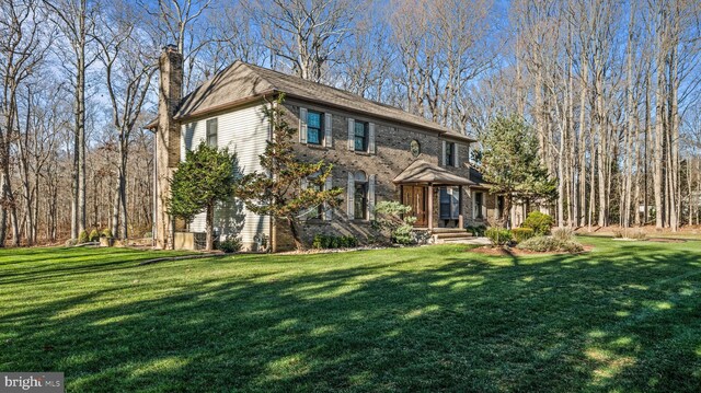 view of front of home with a front lawn