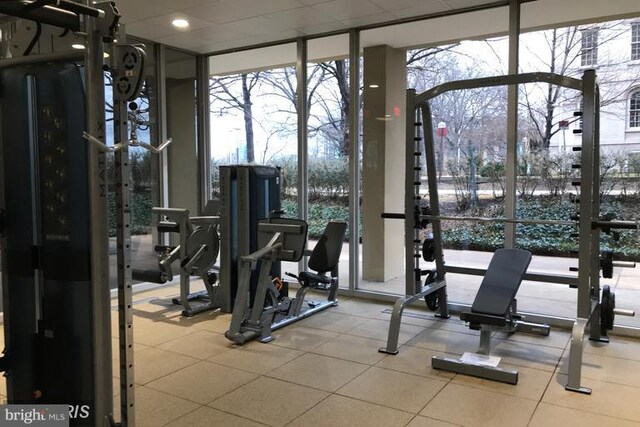 workout area featuring expansive windows