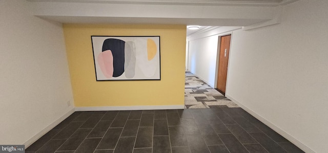 hallway with dark hardwood / wood-style flooring