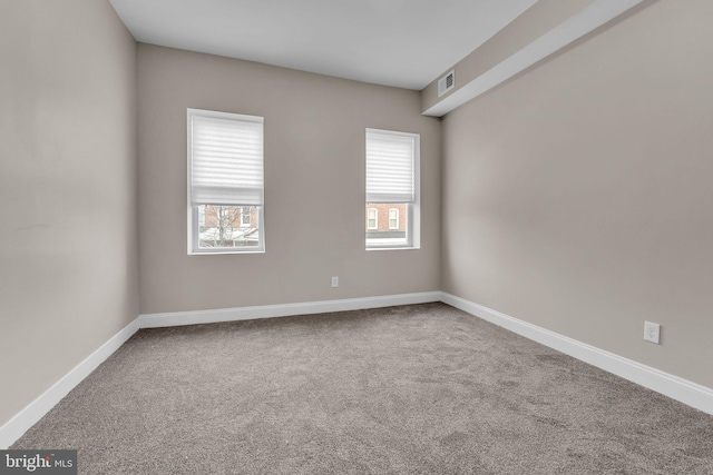 empty room with carpet floors