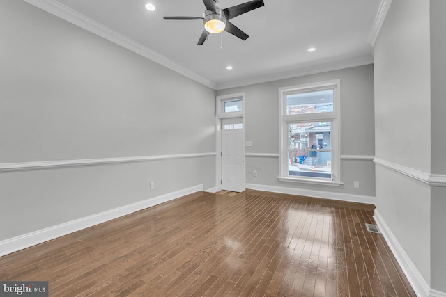 unfurnished room featuring hardwood / wood-style floors, ceiling fan, and ornamental molding