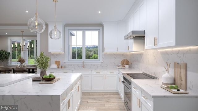 kitchen featuring exhaust hood, decorative light fixtures, white cabinets, light hardwood / wood-style floors, and stainless steel electric range oven