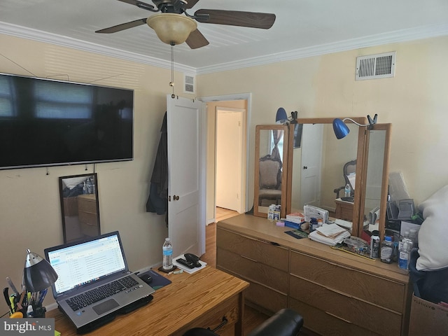 office featuring wood-type flooring and crown molding