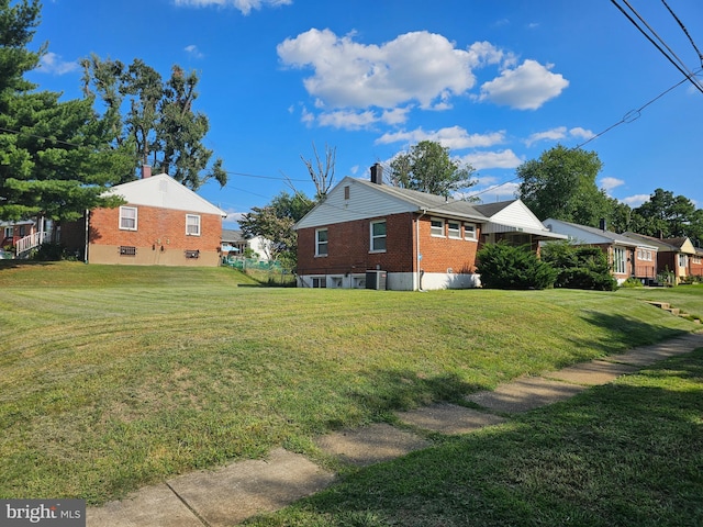 view of home's exterior featuring a lawn