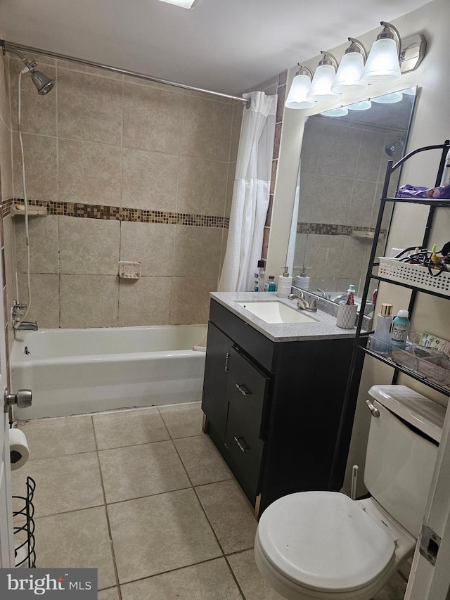 full bathroom with tile patterned flooring, vanity, shower / bath combination with curtain, and toilet