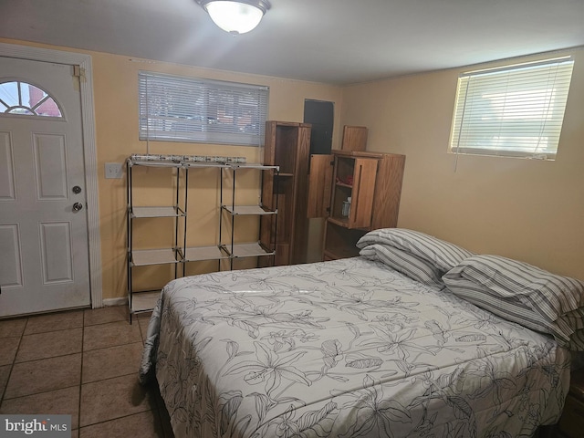 bedroom featuring tile patterned floors