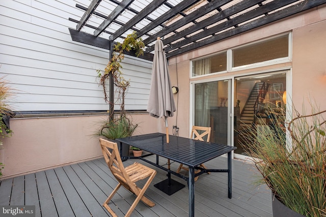 wooden terrace with a pergola