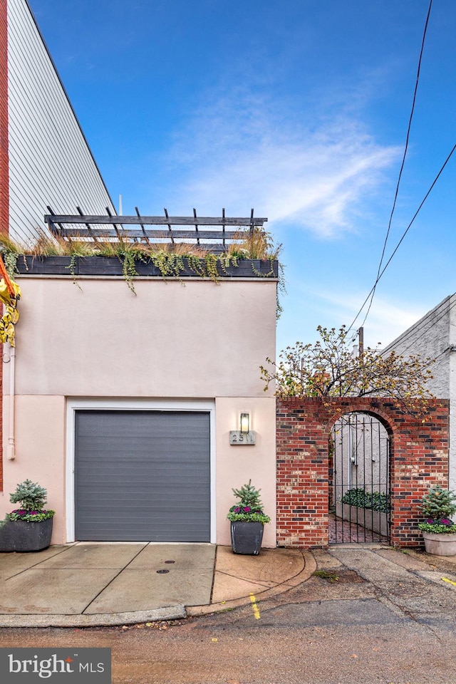 view of front of home featuring a garage