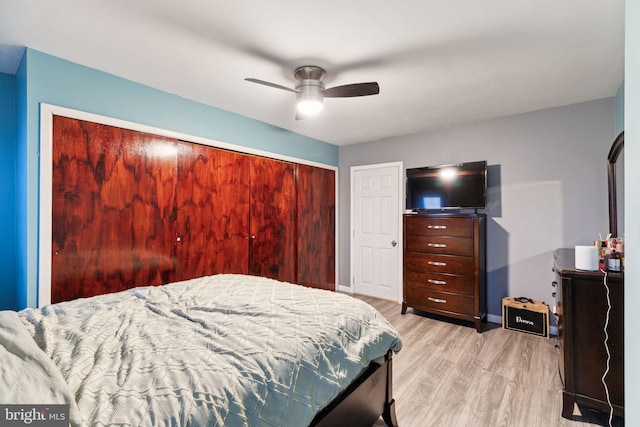 bedroom featuring ceiling fan and light hardwood / wood-style floors