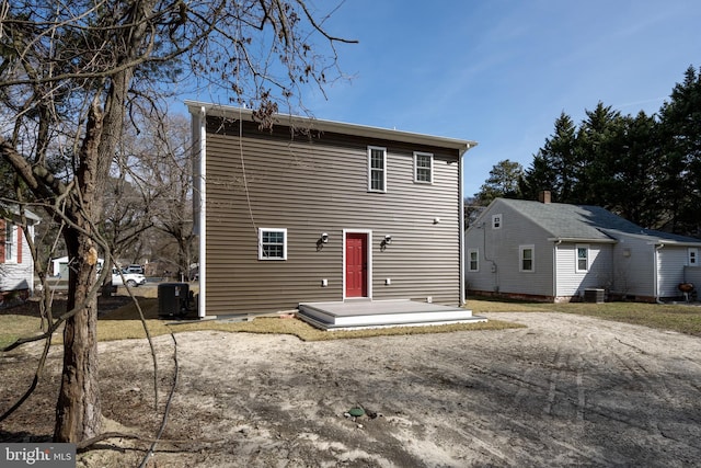 back of property with central air condition unit