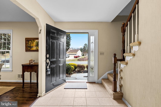 entrance foyer featuring light tile patterned floors