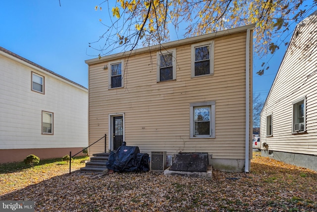 back of property with cooling unit