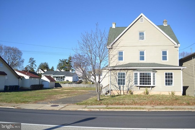 view of front of house featuring a front yard