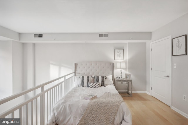 bedroom with light hardwood / wood-style floors