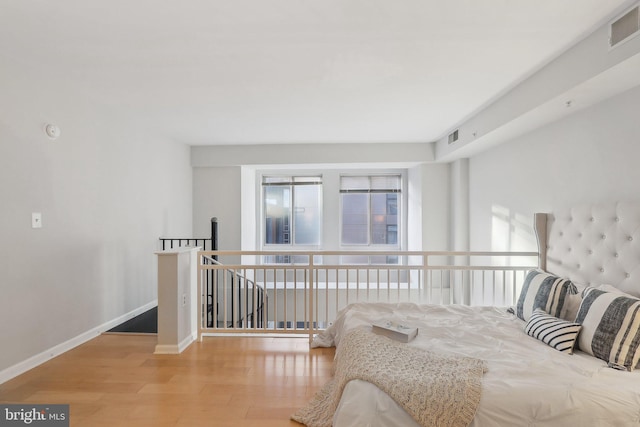 bedroom with light wood-type flooring