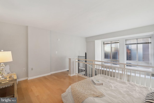 bedroom with light hardwood / wood-style floors