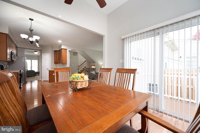 dining room featuring a healthy amount of sunlight and light hardwood / wood-style floors