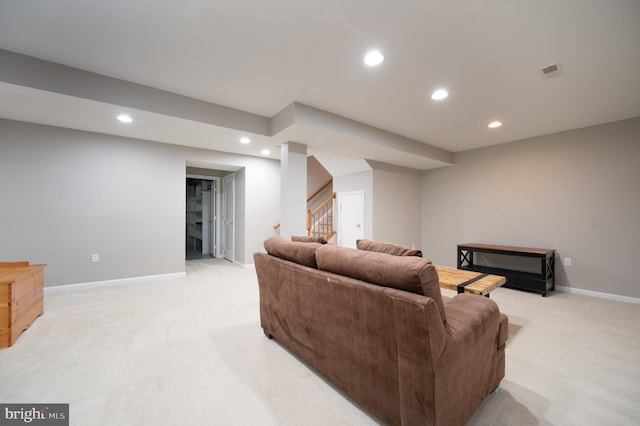 living room featuring light carpet