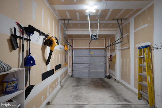 garage featuring a garage door opener