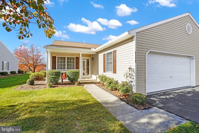 single story home with a front yard, a porch, and a garage