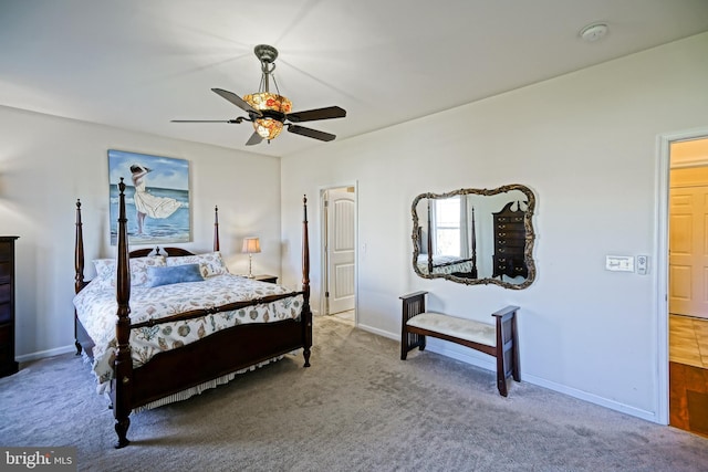 bedroom with ceiling fan and carpet