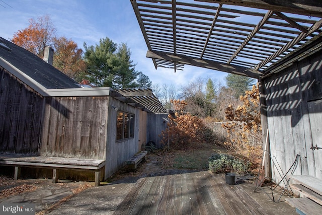 wooden terrace featuring a pergola