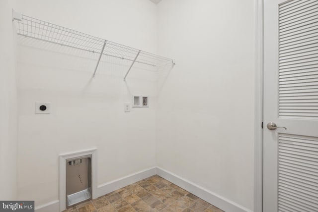 washroom with hookup for an electric dryer and washer hookup