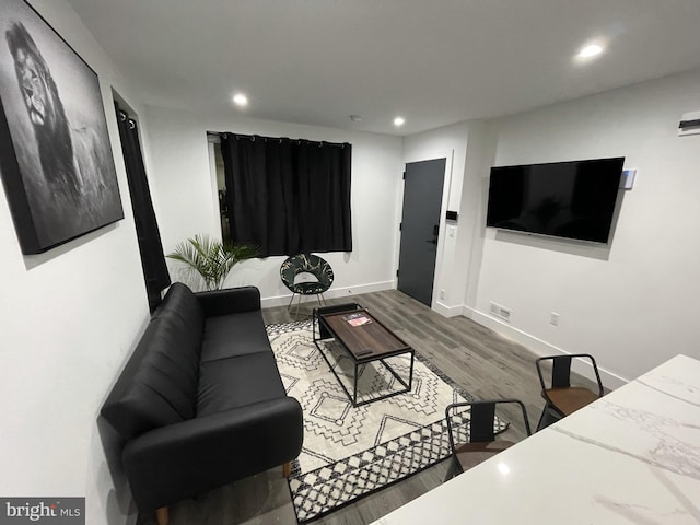 living room with hardwood / wood-style flooring