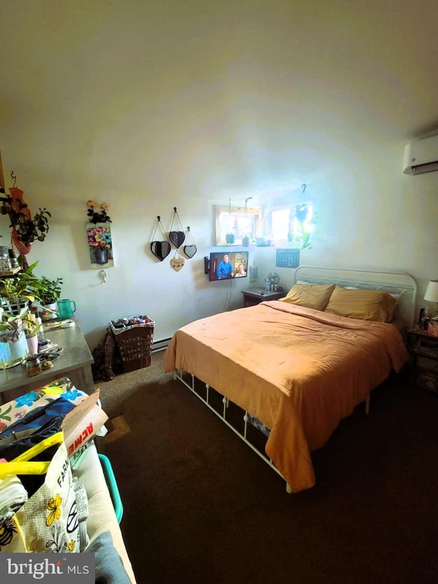 carpeted bedroom featuring a wall unit AC