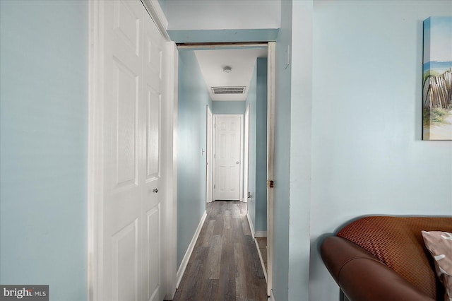 hall with dark hardwood / wood-style flooring