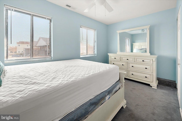 carpeted bedroom with ceiling fan