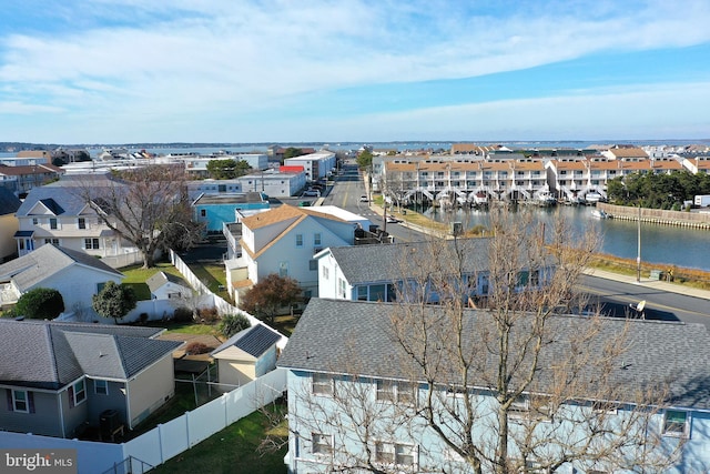 drone / aerial view with a water view