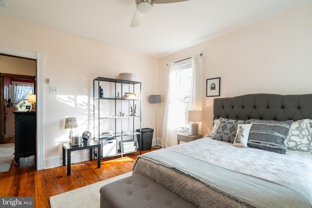 bedroom featuring hardwood / wood-style flooring and ceiling fan