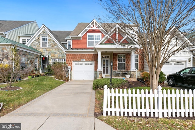 craftsman-style home featuring a front lawn, a porch, and a garage