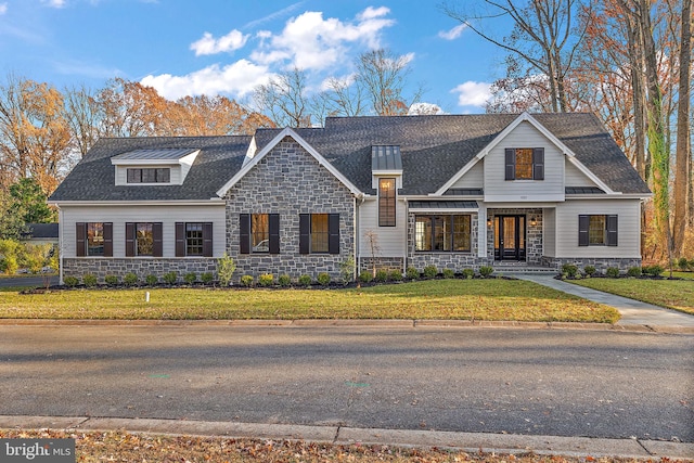 view of front of property with a front lawn