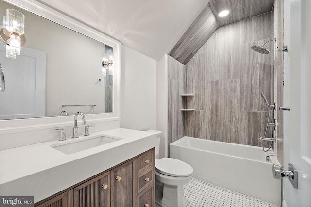 full bathroom with vanity, toilet, and tiled shower / bath