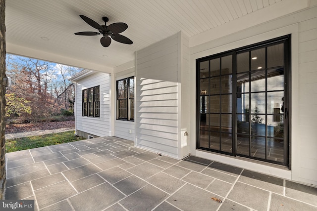 view of patio / terrace featuring ceiling fan