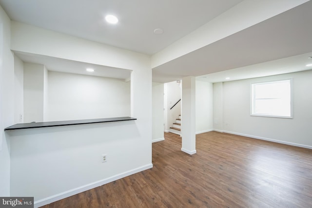 basement with wood-type flooring