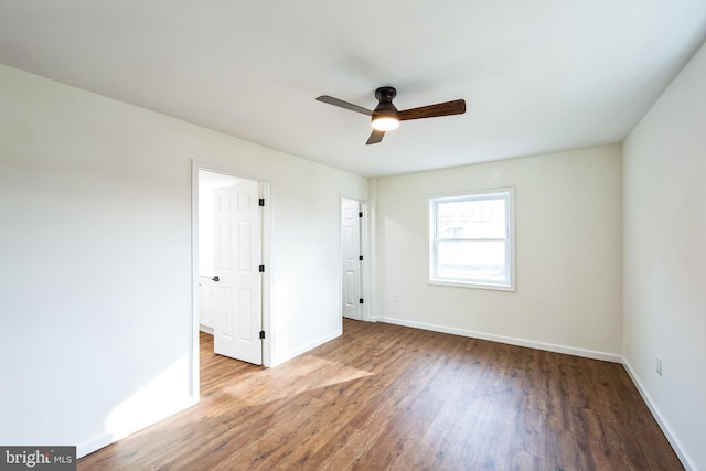 unfurnished bedroom featuring ceiling fan and wood-type flooring