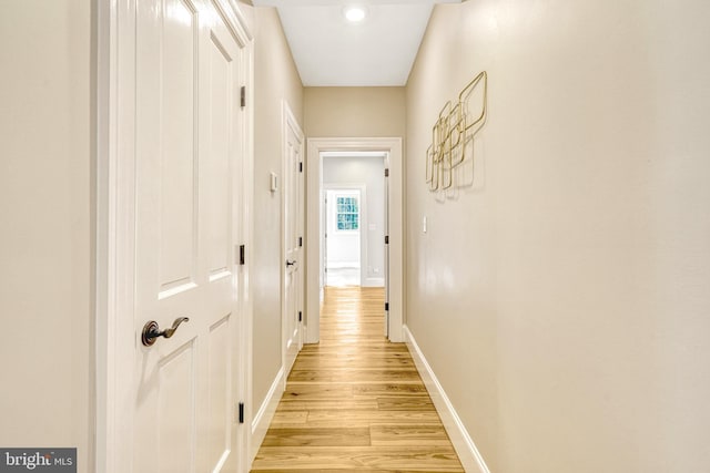 corridor featuring light wood-type flooring