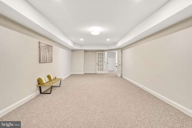 basement with carpet flooring