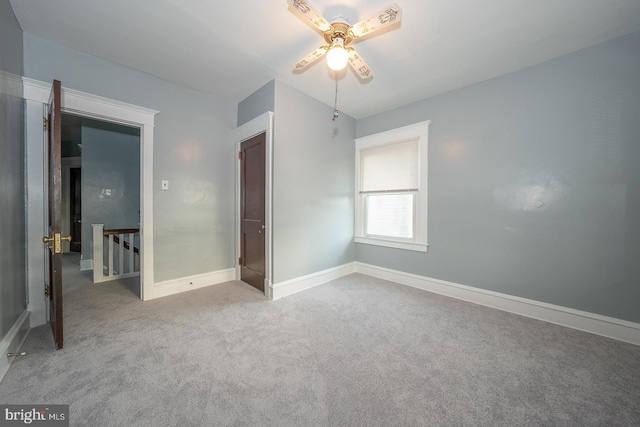 unfurnished bedroom with carpet flooring and ceiling fan