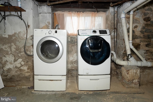 laundry room featuring separate washer and dryer