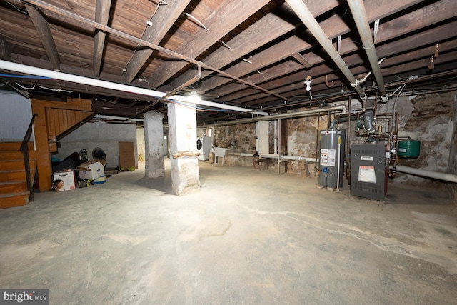 basement featuring gas water heater