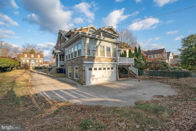 view of home's exterior with a garage